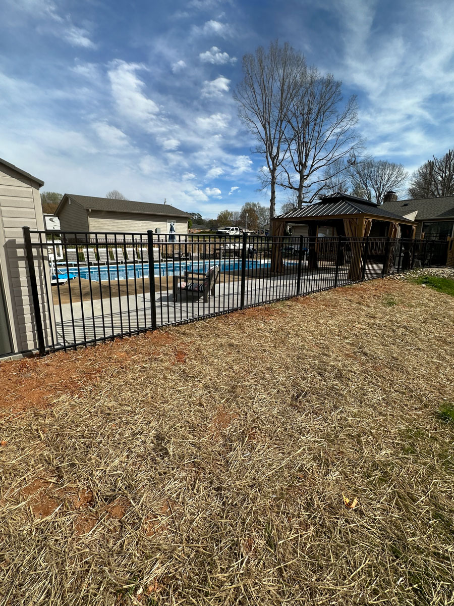 black aluminum pool fence installed by Francis Brothers LLC